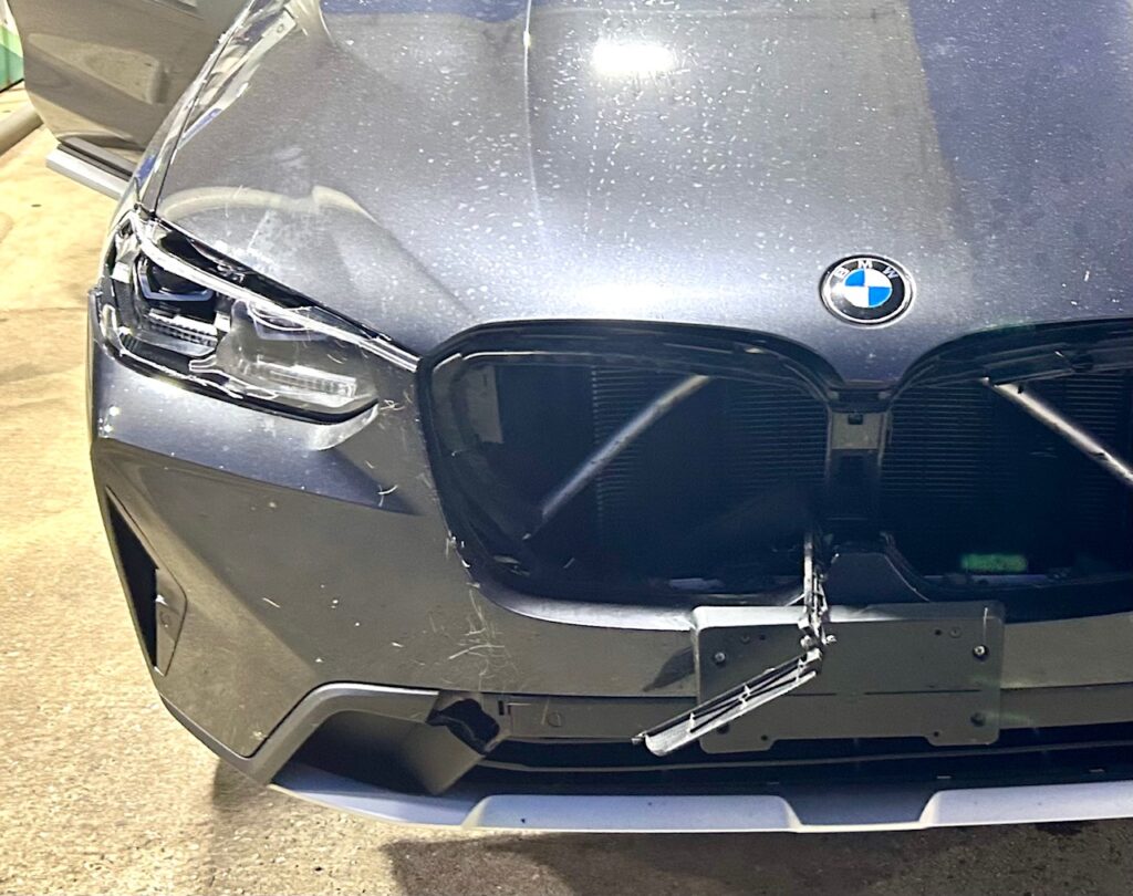smashed front grill of BMW