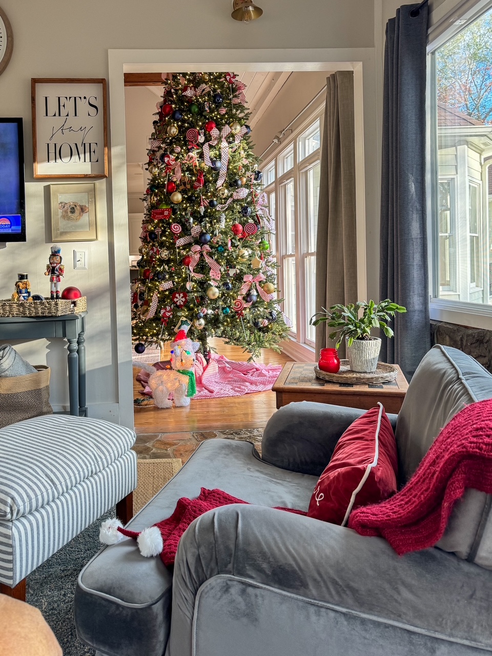 gray accent chair with tree in background