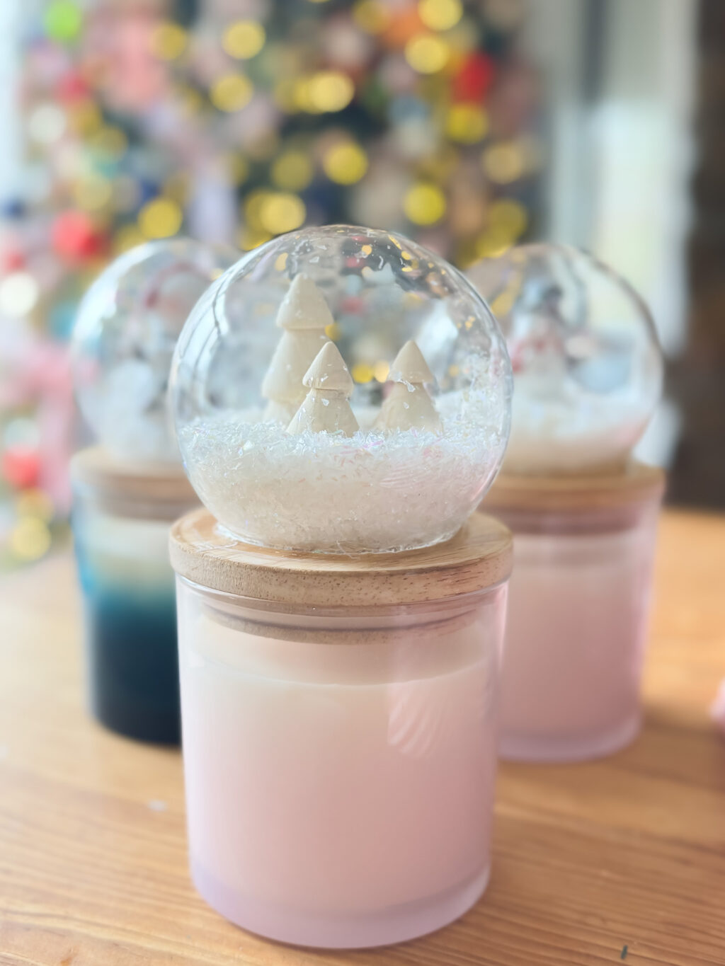 candles with snow globe candle topper